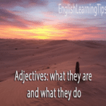 A desert landscape at sunset with text overlay reading "Adjectives: what they are and what they do."