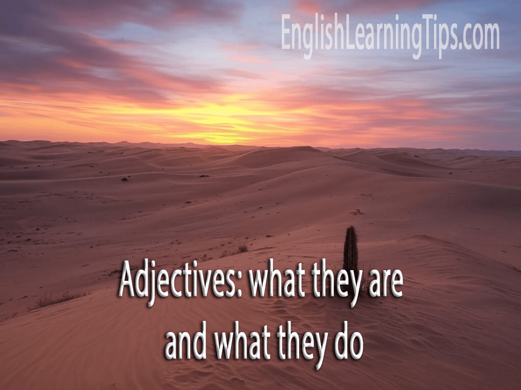 A desert landscape at sunset with text overlay reading "Adjectives: what they are and what they do."