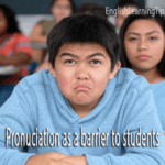 A frustrated ESL student looking sad and confused while studying English pronunciation.