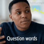 Man looking confused acting out the question 'but how' in an english lesson