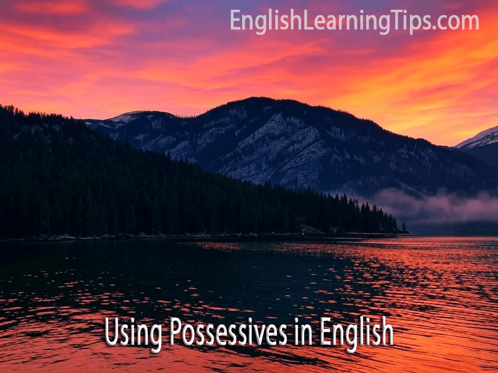 A landscape of mountains and a lake at sunset with the text "Using Possessives in English"