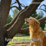 A golden retriever dog looking up and barking at a large tree branch, illustrating the funny idiom barking up the wrong tree.
