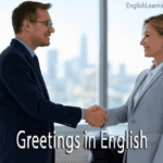 A man and woman in business suits smiling and shaking hands in an office, illustrating formal English greetings.