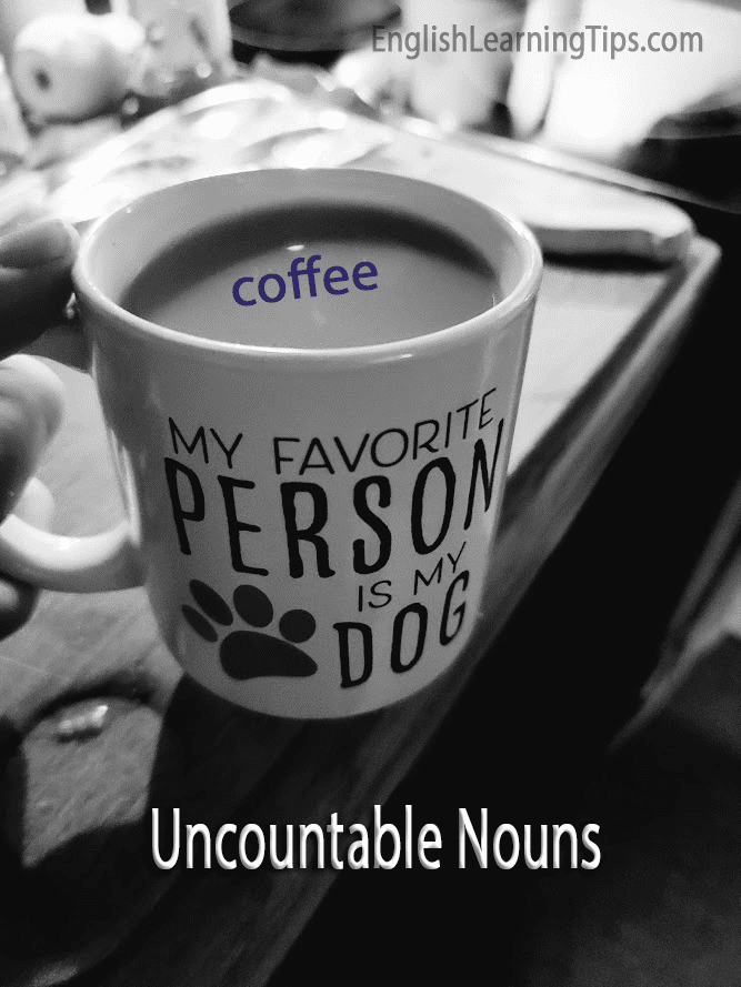 A black and white photo of a mug containing coffee with the word "coffee" overlaid. The mug features text that reads "My favorite person is my dog" to illustrate the difference between uncountable and countable nouns.