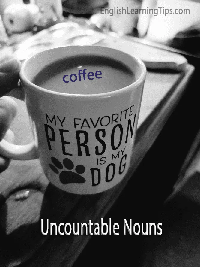 A black and white photo of a mug containing coffee with the word "coffee" overlaid. The mug features text that reads "My favorite person is my dog" to illustrate the difference between uncountable and countable nouns.