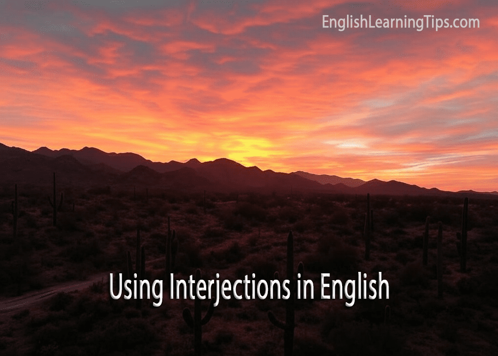 A desert landscape at sunset with the text Using Interjections in English overlaid, serving as a featured image for a grammar guide.