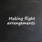 A blackboard with the text "Making flight arrangements" written in white chalk, used for an ESL lesson plan.