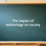 A green classroom chalkboard with the text "The impact of technology on society" written on it for an ESL lesson.